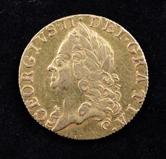 A George II 1759 gold guinea,